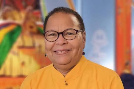 Jan Willis in orange shirt